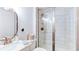 Modern bathroom features sleek fixtures and glass enclosed shower stall at 3290 Cherry Oak Ln, Cumming, GA 30041