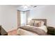 Bedroom featuring neutral walls, wood floors, and natural light at 3290 Cherry Oak Ln, Cumming, GA 30041