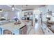 Spacious kitchen with white cabinetry, a center island, stainless appliances, and pendant lights at 3290 Cherry Oak Ln, Cumming, GA 30041