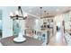 Bright eat-in kitchen with a center island, stainless appliances, and light countertops at 3290 Cherry Oak Ln, Cumming, GA 30041