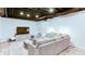 Relax in the cozy living room with exposed ductwork and open concept at 3290 Cherry Oak Ln, Cumming, GA 30041