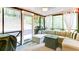 Enjoy the screened porch with outdoor seating at 3290 Cherry Oak Ln, Cumming, GA 30041