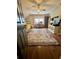 Bright and airy bedroom with a daybed, patterned rug, and natural light at 3532 W Hampton Nw Dr, Marietta, GA 30064