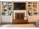 Beautiful fireplace with built-in shelves, perfect for displaying decor and adding warmth to the living space at 3532 W Hampton Nw Dr, Marietta, GA 30064