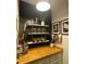 Well-organized butler's pantry featuring butcher block countertops, ample shelving, and stylish storage solutions at 3532 W Hampton Nw Dr, Marietta, GA 30064