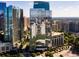 Contemporary building exterior with floor-to-ceiling windows in a modern, urban setting on a clear, sunny day at 1065 Peachtree Ne St # 3505, Atlanta, GA 30309