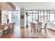 Open concept dining area with floor to ceiling windows, offering stunning city views at 1065 Peachtree Ne St # 3505, Atlanta, GA 30309