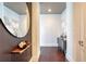 Inviting hallway with modern decor, wood floors, and stylish accents leading into the home at 1065 Peachtree Ne St # 3505, Atlanta, GA 30309