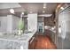 Modern kitchen featuring granite countertops, stainless steel appliances, and ample cabinet space at 1065 Peachtree Ne St # 3505, Atlanta, GA 30309