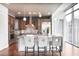 Well-designed kitchen with an island, stainless steel appliances, and a breakfast bar area at 1065 Peachtree Ne St # 3505, Atlanta, GA 30309