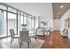 Bright living room area featuring floor to ceiling windows and modern neutral decor at 1065 Peachtree Ne St # 3505, Atlanta, GA 30309