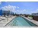 Stunning rooftop pool with lounge chairs and city views offers a luxurious outdoor experience at 1065 Peachtree Ne St # 3505, Atlanta, GA 30309
