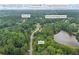 Aerial view of home with close proximity to Ozora Lake, McConnell Middle School and Cooper Elementary School at 2990 Cove Crossing Dr, Lawrenceville, GA 30045
