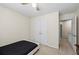 Neutral bedroom featuring a ceiling fan, closet, and minimalist decor creating a cozy, simple aesthetic at 2990 Cove Crossing Dr, Lawrenceville, GA 30045