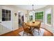 Bright breakfast nook with natural lighting from windows and backyard views at 2990 Cove Crossing Dr, Lawrenceville, GA 30045
