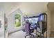 Home office with a window and an ergonomic chair, perfect for work or gaming at 2990 Cove Crossing Dr, Lawrenceville, GA 30045