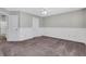 Carpeted bedroom with wainscoting and neutral paint at 417 Red Coat Ln, Woodstock, GA 30188