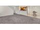 Cozy living space with fireplace, adjacent to the dining area and kitchen at 417 Red Coat Ln, Woodstock, GA 30188