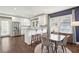 Bright, white kitchen with stainless steel appliances and granite countertops at 458 Holly Nw St, Atlanta, GA 30318