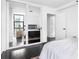 Bright bedroom features a wall of mirrored closets and neutral decor at 620 Peachtree Ne St # 1206, Atlanta, GA 30308