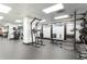 A modern gym equipped with various weight machines, cardio equipment, and free weights for a full-body workout at 620 Peachtree Ne St # 1206, Atlanta, GA 30308