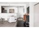 Open-concept living area with modern console, stainless steel appliances and an open concept space at 620 Peachtree Ne St # 1206, Atlanta, GA 30308