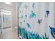 Bathroom with shower curtain featuring sea turtles and seahorses at 2385 Saddle Brook Trce, Cumming, GA 30040
