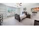 Bedroom with built-in shelves and window seating, and decorative furniture set at 2385 Saddle Brook Trce, Cumming, GA 30040