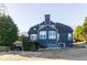 Back exterior of the home with a cozy fire pit at 271 Double Gate Ct, Sugar Hill, GA 30518