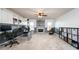 Bright office with built in bookcases, storage, and fireplace at 271 Double Gate Ct, Sugar Hill, GA 30518