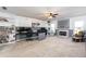Office features a fireplace, built-in shelving, and modern decor at 271 Double Gate Ct, Sugar Hill, GA 30518