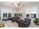 Bright sunroom with vaulted ceilings and large windows offering outdoor views at 271 Double Gate Ct, Sugar Hill, GA 30518