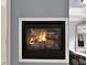 A warm and inviting fireplace providing a focal point and cozy atmosphere in the room at 2725 Bailey Ne Pl, Conyers, GA 30013
