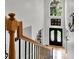Elegant foyer with hardwood floors, staircase, and a view of the front door at 2725 Bailey Ne Pl, Conyers, GA 30013