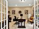 Inviting home office featuring a large desk, neutral walls, and a cozy chair at 2725 Bailey Ne Pl, Conyers, GA 30013