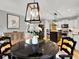 Spacious kitchen with an island, pendant lighting, stainless steel appliances, and a casual eating area for Gathering meals at 2725 Bailey Ne Pl, Conyers, GA 30013