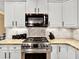 Well-appointed kitchen with granite countertops, stainless steel appliances, and ample cabinet space for efficient cooking at 2725 Bailey Ne Pl, Conyers, GA 30013