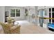 Upstairs landing area featuring a sitting area and railing overlooking downstairs at 2725 Bailey Ne Pl, Conyers, GA 30013