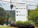 Signage indicating directions to GA Hwy. 138, I-20, and GA Hwy. 20 near the Piedmont facility at 2725 Bailey Ne Pl, Conyers, GA 30013