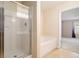 Bathroom showcasing shower and soaking tub next to primary bedroom at 3262 Cascade Parc Blvd, Atlanta, GA 30311