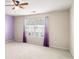 Bedroom with carpet, a ceiling fan, and a window providing natural light at 3262 Cascade Parc Blvd, Atlanta, GA 30311