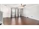 Bright living room featuring dark hardwood floors, neutral paint, and natural light at 3262 Cascade Parc Blvd, Atlanta, GA 30311