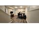 Finished basement with hard wood floors, television, eating table and chairs at 4162 Riverdale Dr, Snellville, GA 30039