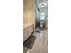 Bathroom featuring tile floors, white vanity and shower with curtain at 4162 Riverdale Dr, Snellville, GA 30039