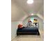 Cozy bedroom with blue cover, stuffed animals and storage shelving, offering a playful and comfortable space at 4162 Riverdale Dr, Snellville, GA 30039