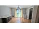 Bright dining room with hardwood floors and large window at 4162 Riverdale Dr, Snellville, GA 30039