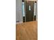 Stylish front door with decorative glass panels and hardwood flooring at 4162 Riverdale Dr, Snellville, GA 30039