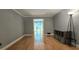 Spacious living room with hardwood floors and modern lighting at 4162 Riverdale Dr, Snellville, GA 30039