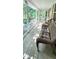 Inviting covered porch with comfortable wicker seating and beautiful views at 4162 Riverdale Dr, Snellville, GA 30039