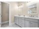 Bathroom features a double vanity with marble countertops at 504 Angier Ne Ave, Atlanta, GA 30308